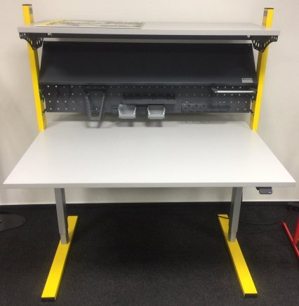 Electrically height-adjustable work table